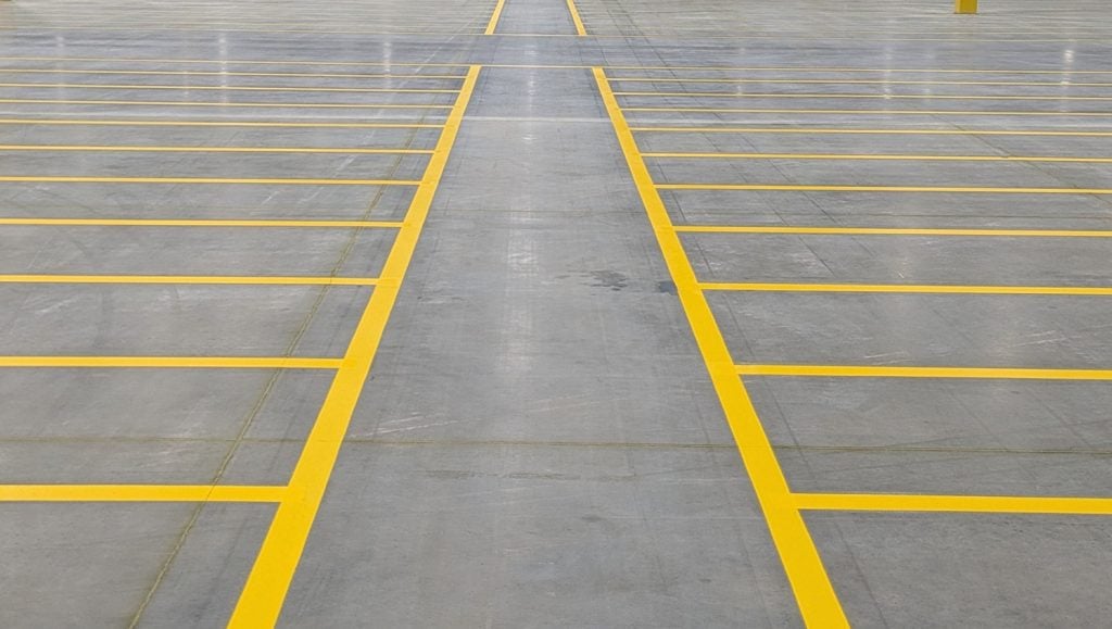 close-up line markings freshly painted for Document Solutions Company warehouse