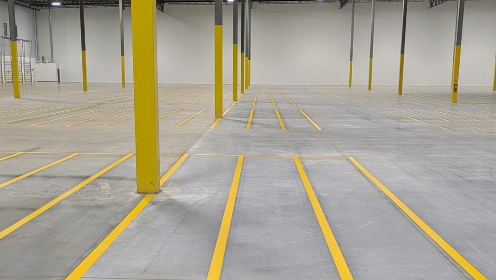 Document Solutions Company warehouse with freshly painted line markings close-up