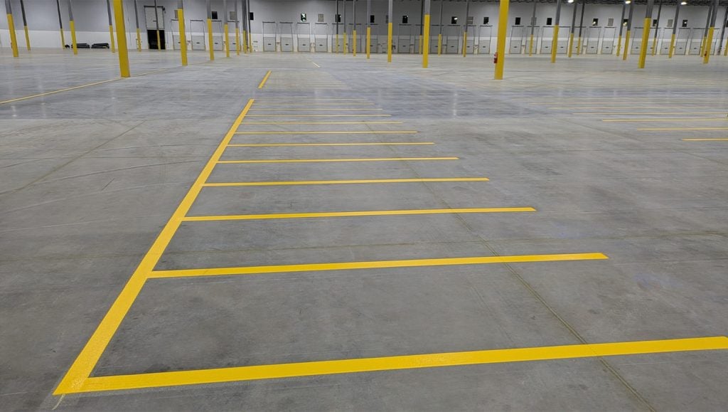 close-up of freshly painted line striping for Document Solutions Company