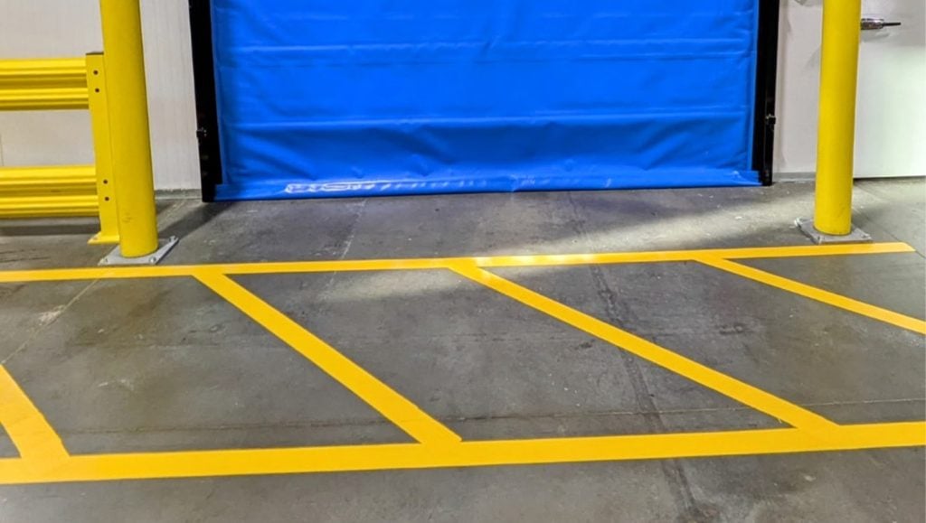 close-up of freshly painted line striping for Biotech Distribution Center warehouse