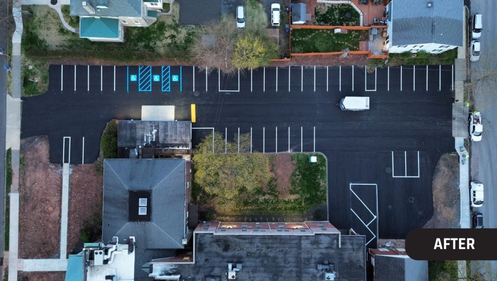 aerial view of business parking lot with freshly painted line markings
