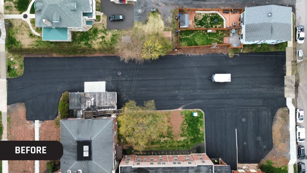 aerial view of business parking lot before new line markings are painted