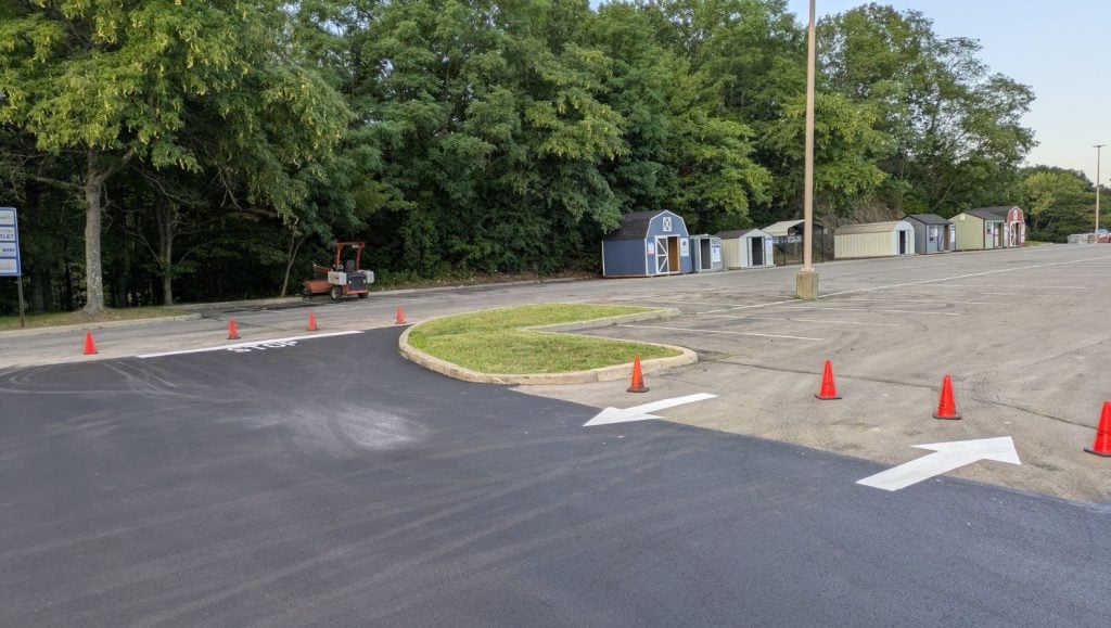 Shopping Center parking lot with freshly painted white arrows