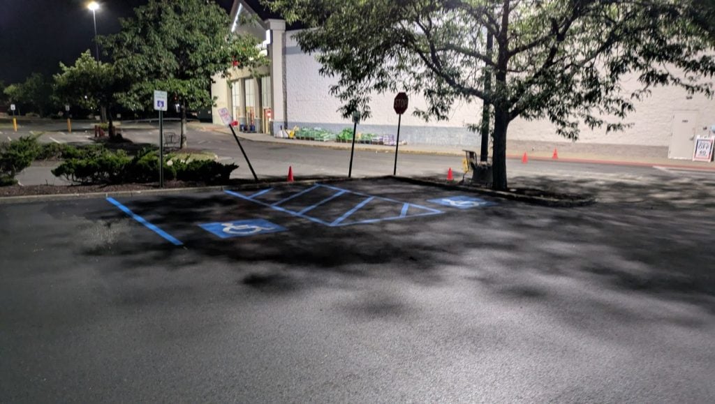 ada compliance parking spots freshly painted for Shopping Center