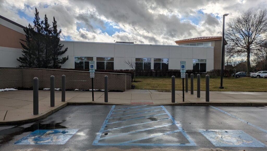 ada compliance parking spots and bollards installed for House of Worship parking lot