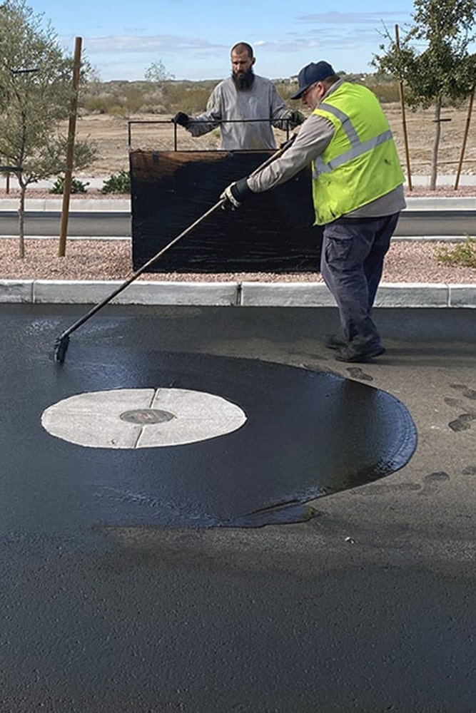 G-FORCE™ workers finishing up a sealcoating project in Buckeye, AZ