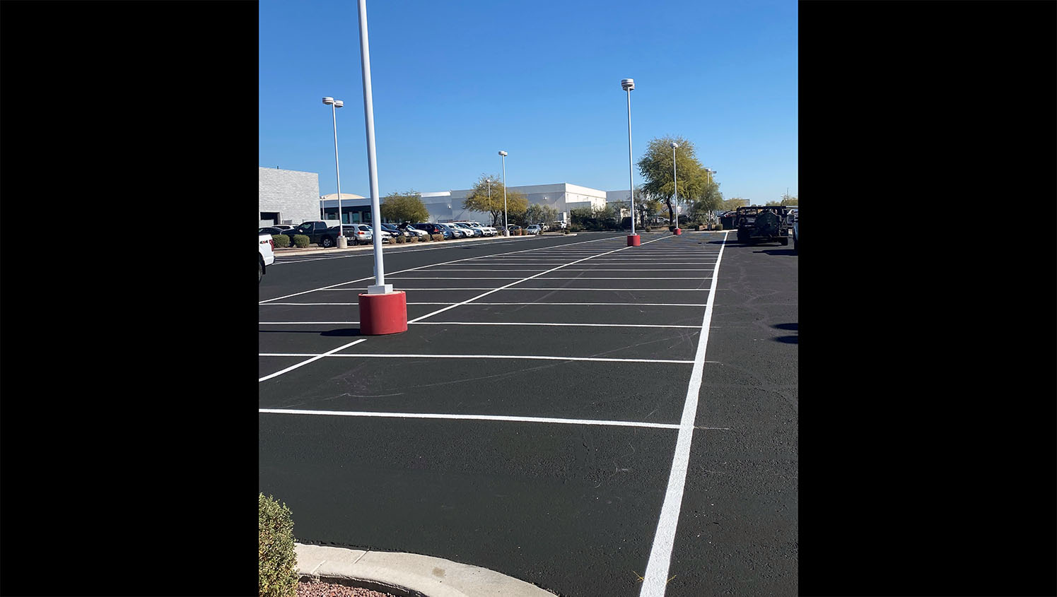 freshly striped parking spaces at Peoria Volkswagen