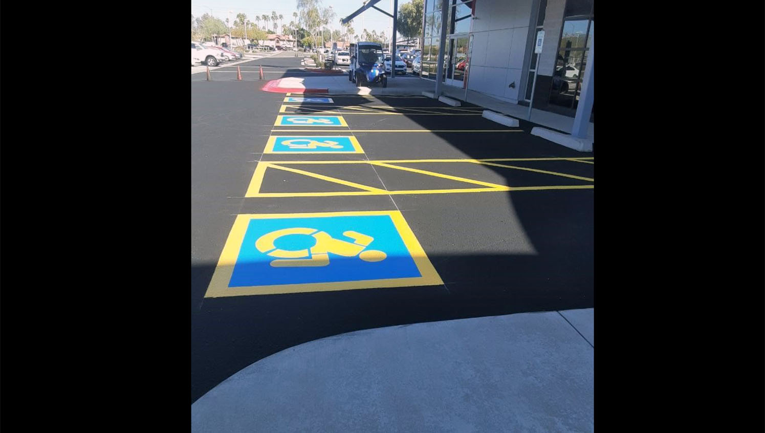 new handicap stalls striped at Peoria Volkswagen