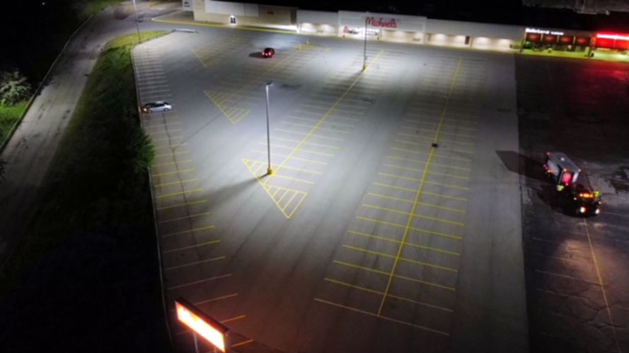 overhead view of a re-striped parking lot at a michael's store