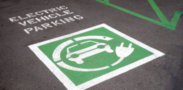 close-up of green ev marking on parking lot