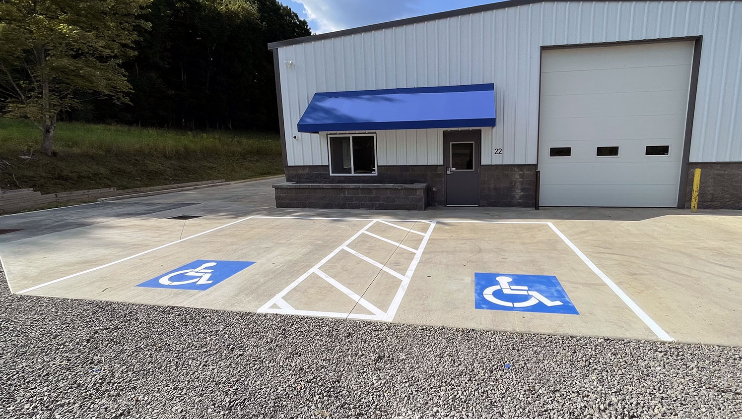 parking lot after striping in ada-compliant stalls