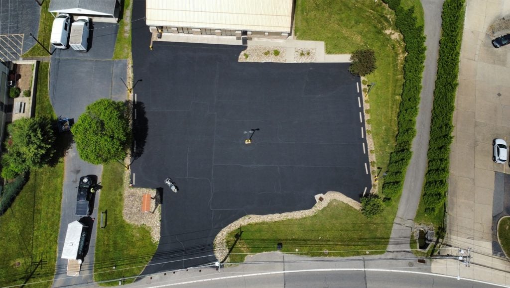 aerial view of Advanced Dental Solutions parking lot with no line markings