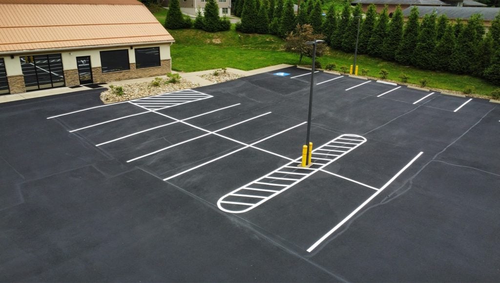 close-up of freshly painted parking spots on Advanced Dental Solutions parking lot