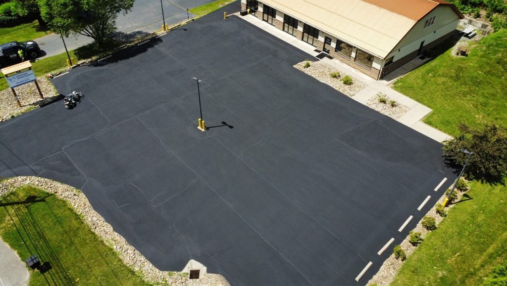 aerial view of Advanced Dental Solutions parking lot with freshly painted parking spots