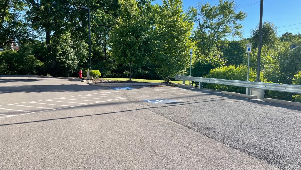 freshly painted arrows on Community Park Storage parking lot