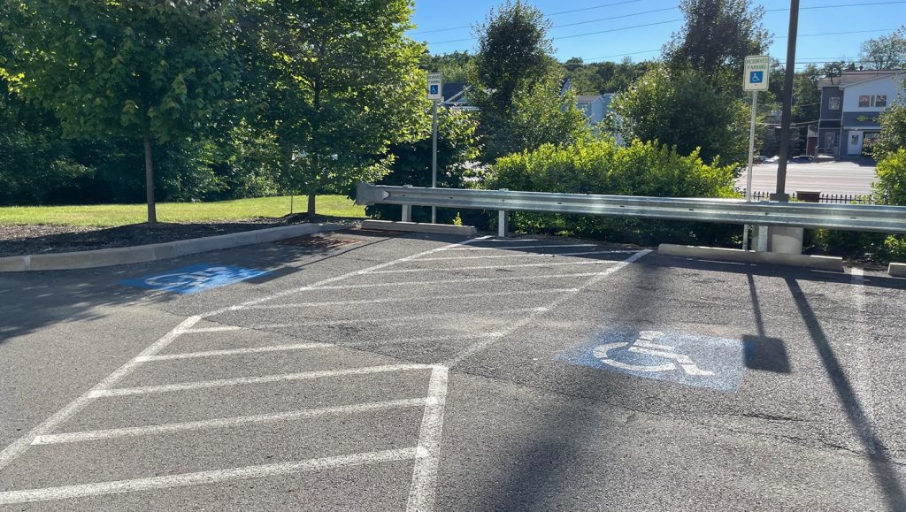 close-up of Community Park Storage parking lot with freshly painted parking spots