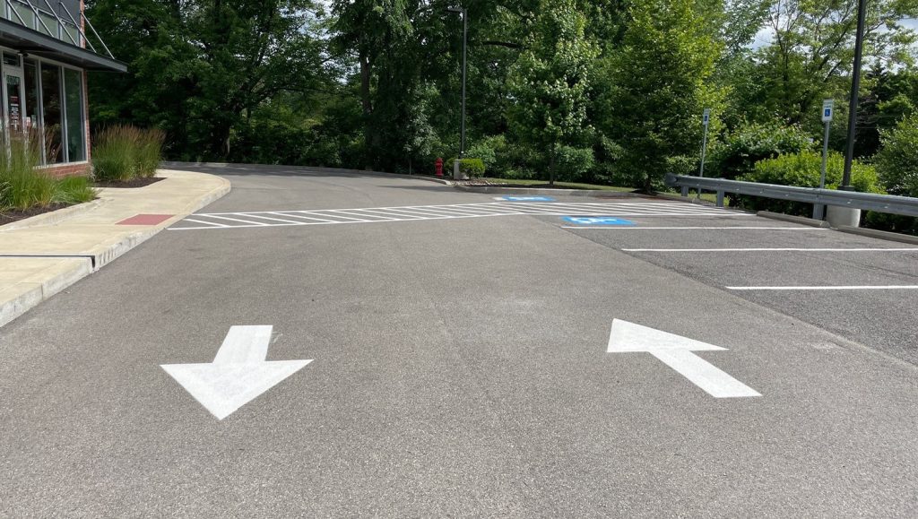 faded parking lot lines on Community Park Storage parking lot