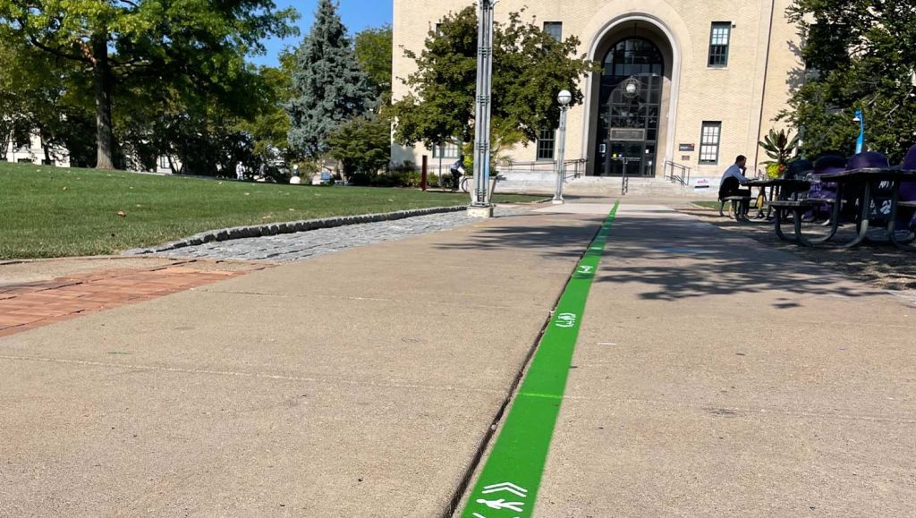 close-up of green line marking for Carnegie Mellon University campus