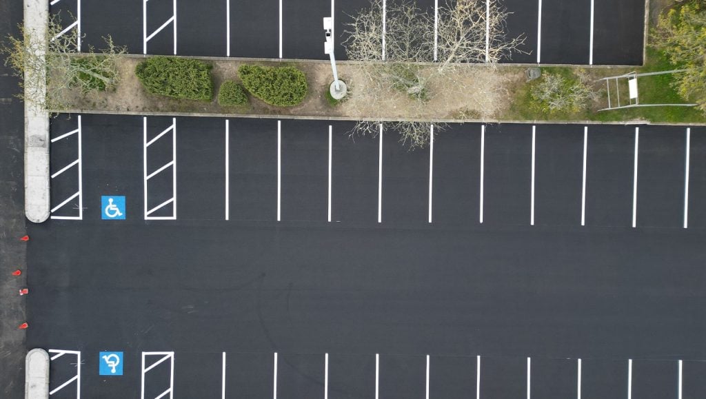 Chamberlain Contractors parking lot with freshly painted lines