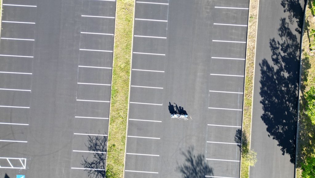 aerial view of Chamberlain Contractors parking lot with freshly painted fire lanes