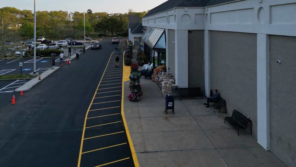 fire lanes freshly painted on Chamberlain Contractors parking lot