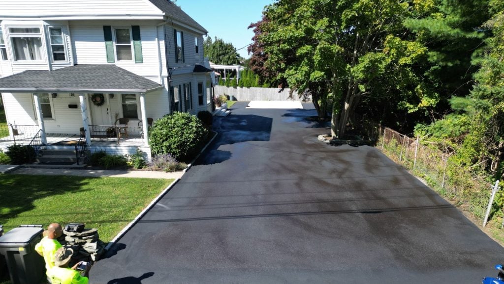 front view of Residential Home with new asphalt driveway