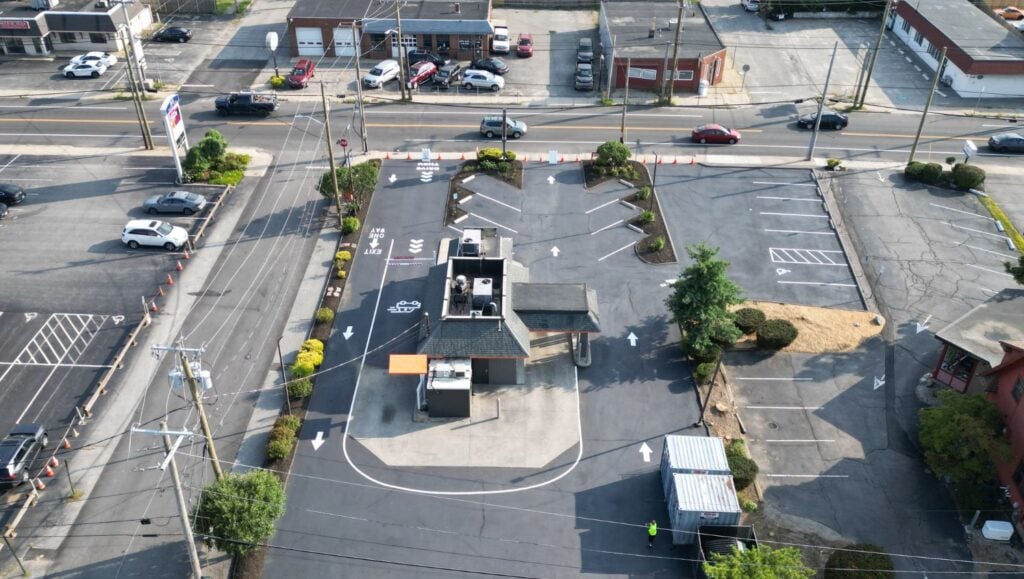 aerial view of Dunkin Donuts parking lot with freshly painted line markings