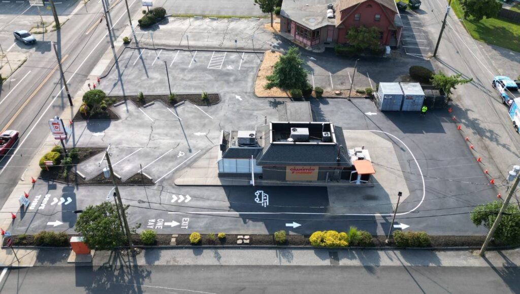 Dunkin Donuts parking lot aerial view with new asphalt