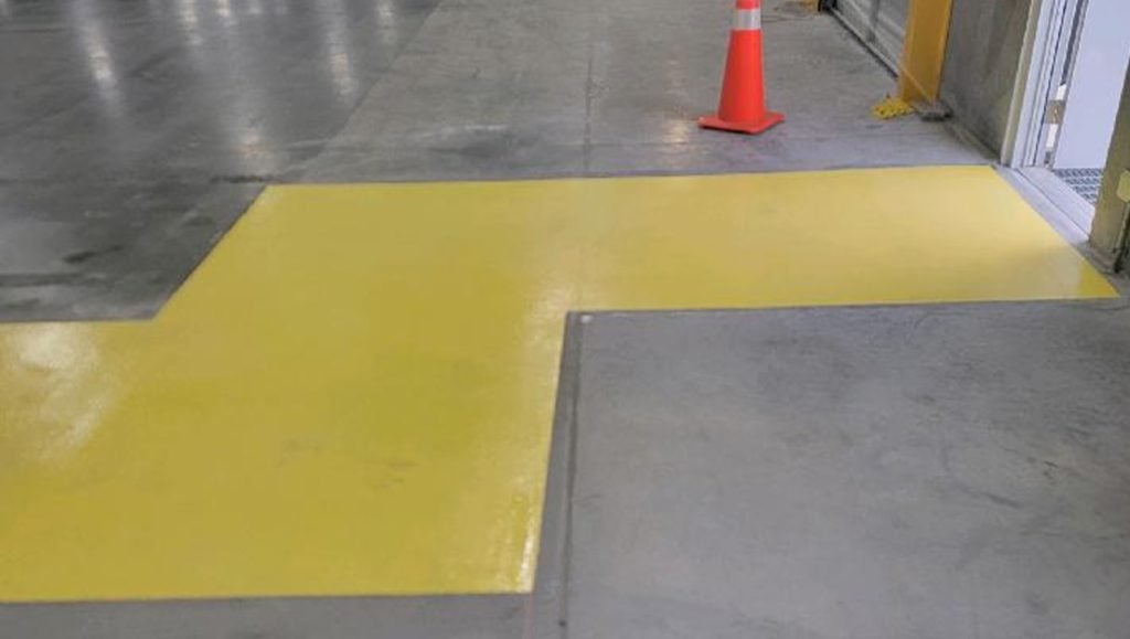 fresh yellow markings in Lowe's Distribution Center warehouse