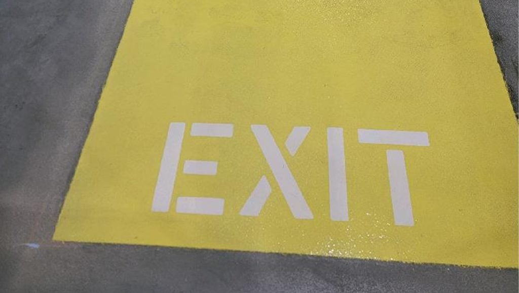 close-up of fresh yellow markings for Lowe's Distribution Center warehouse
