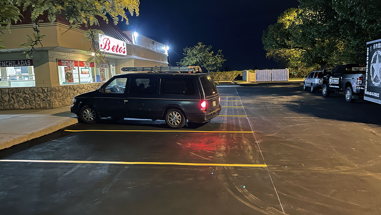 a vehicle parked in Beto's newly striped parking lot in Kearns, UT