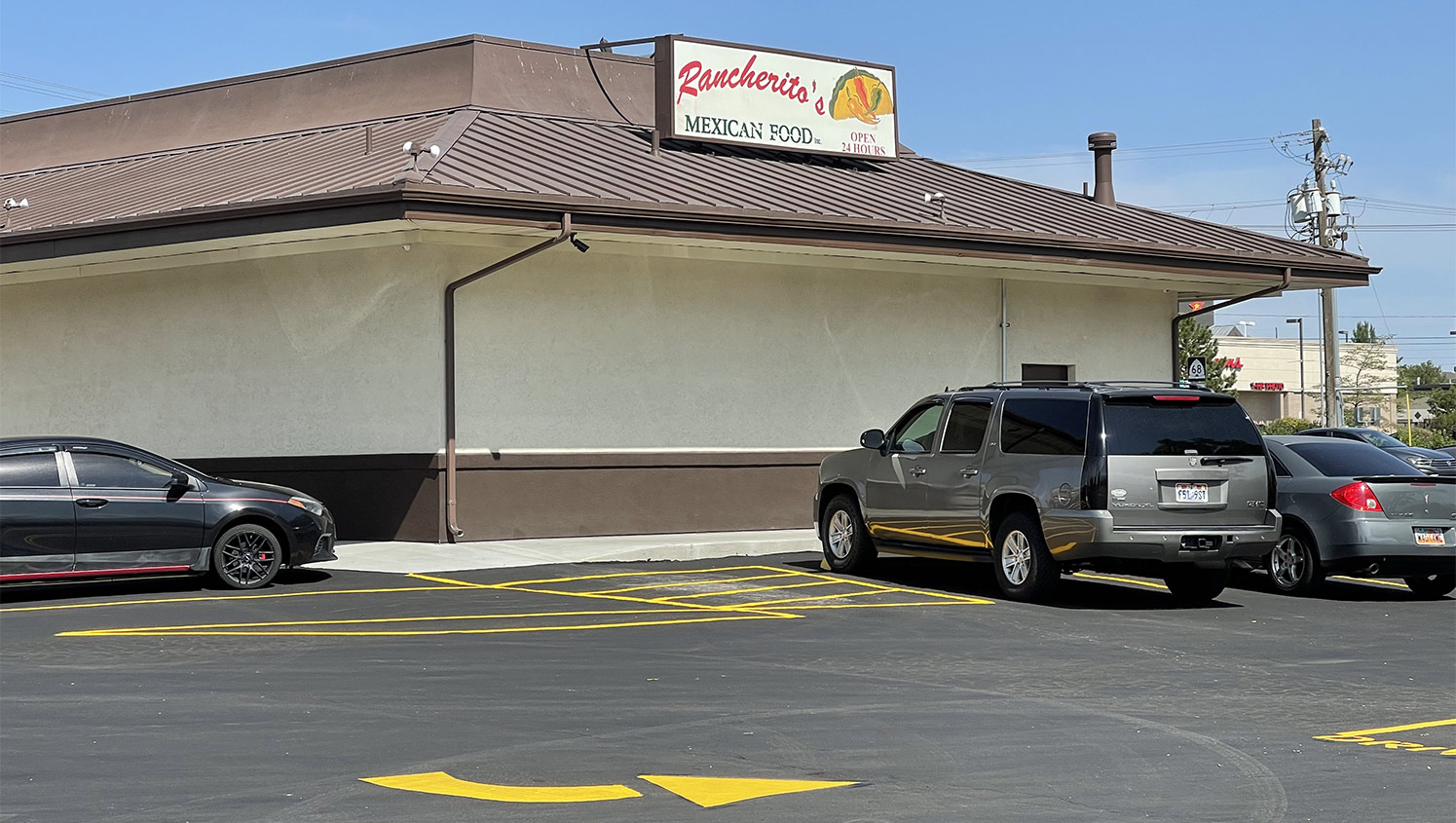 Re-striped parking lot arrows at Racherito’s Mexican Food in West Jordan, Utah