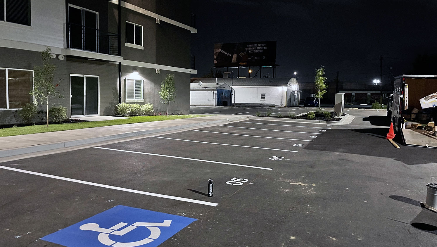 Re-striped ADA compliant parking lot stall at Elite Craft Homes in Ogden, UT