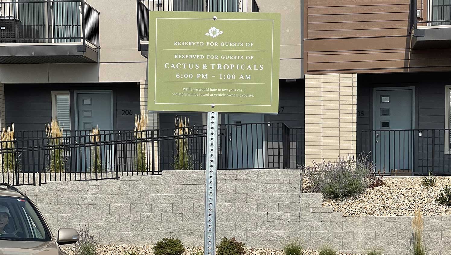 up-close view of reserved parking sign at Cactus & Tropicals in Draper, UT