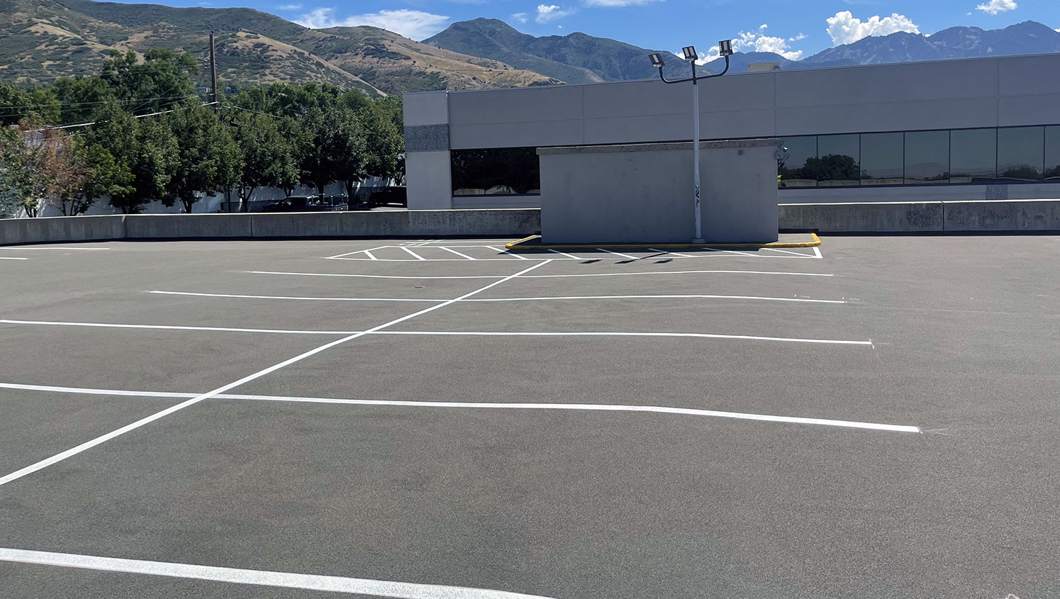 freshly striped parking lot spaces
