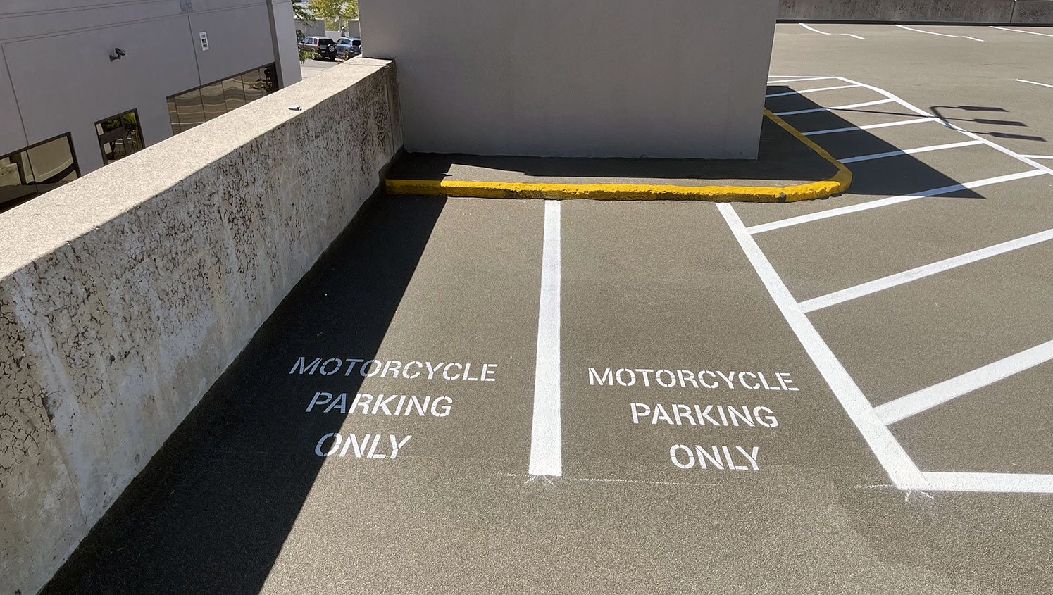newly striped motorcycle parking