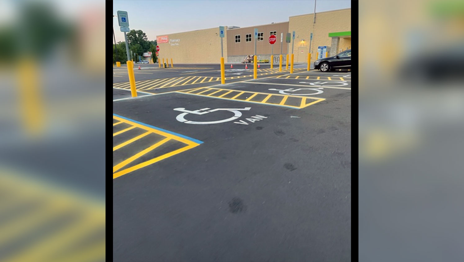 re-striped ada accessible parking stalls at greensboro walmart