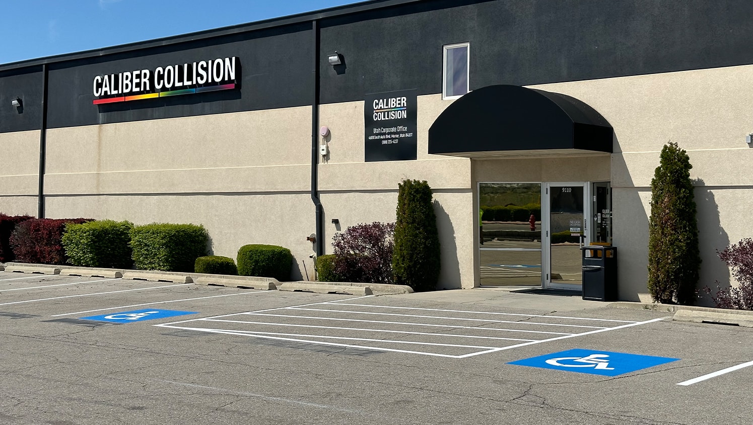 freshly painted parking lot for Caliber Collision