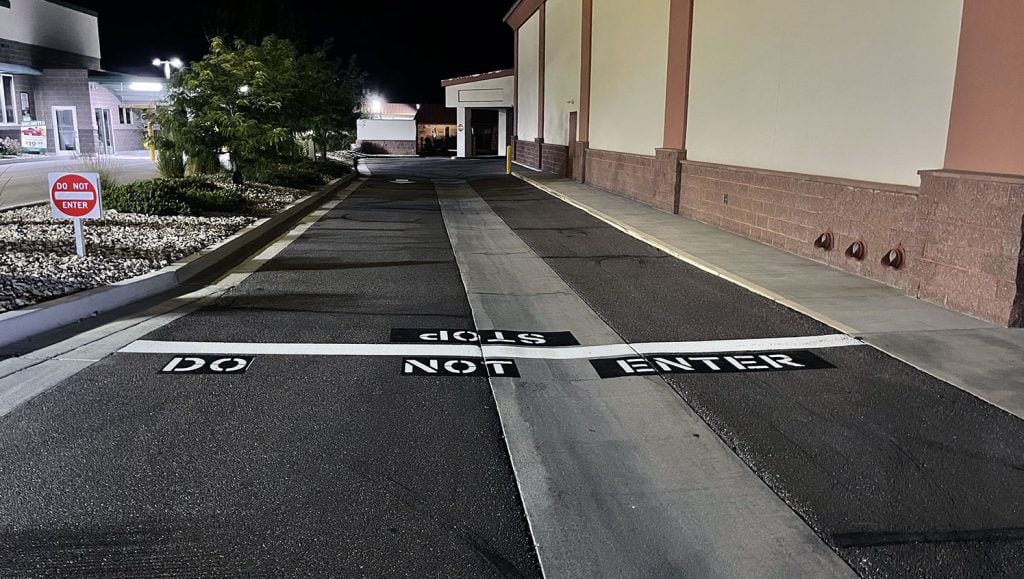 Newly striped directional arrows at a CVS in Roy, UT