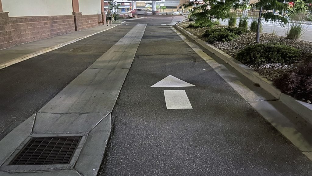 New parking lot stalls striped at a CVS in Roy, UT