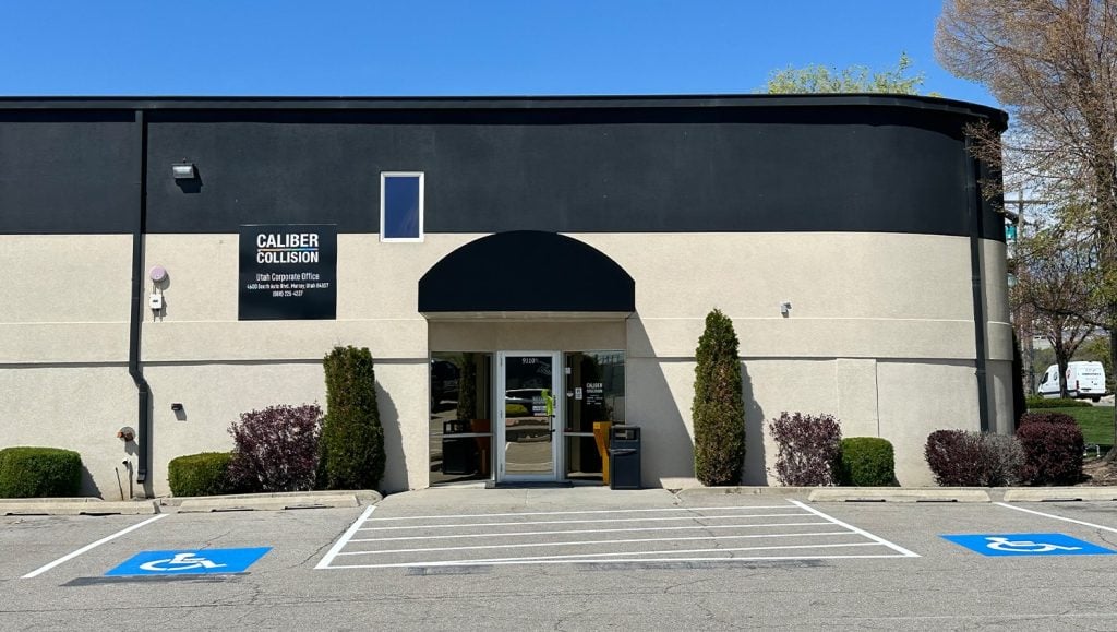 front parking lot with freshly painted lines for Caliber Collision