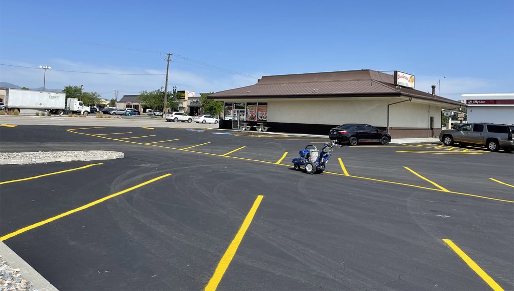 freshly striped parking spaces at Racherito’s Mexican Food in West Jordan, Utah