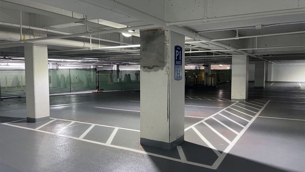line striped parking stall between four pillars in city creek, ut