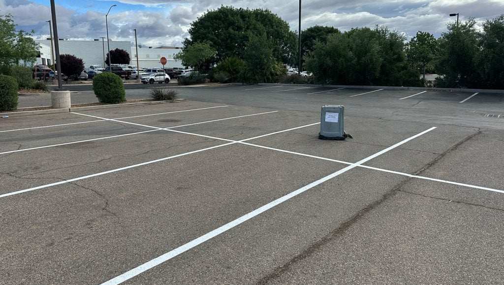 close-up of freshly painted ada parking lot lines