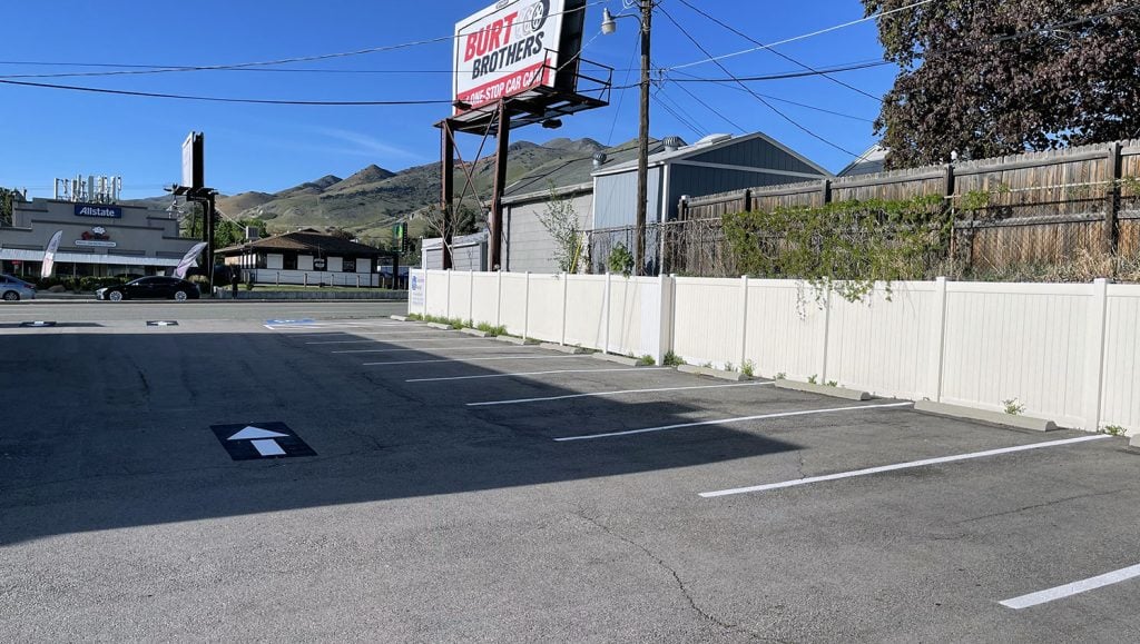 new parking lot stalls and wheel stops at Rising Health Specialty Clinic in Millcreek, UT