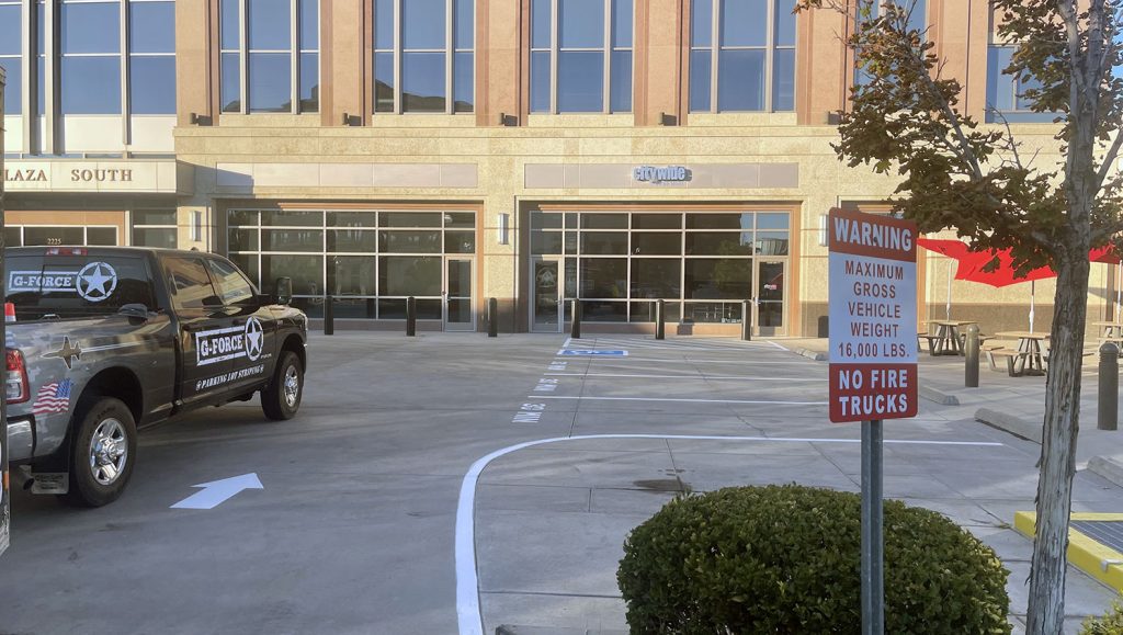 new 30-min and ada-parking stalls striped for plaza