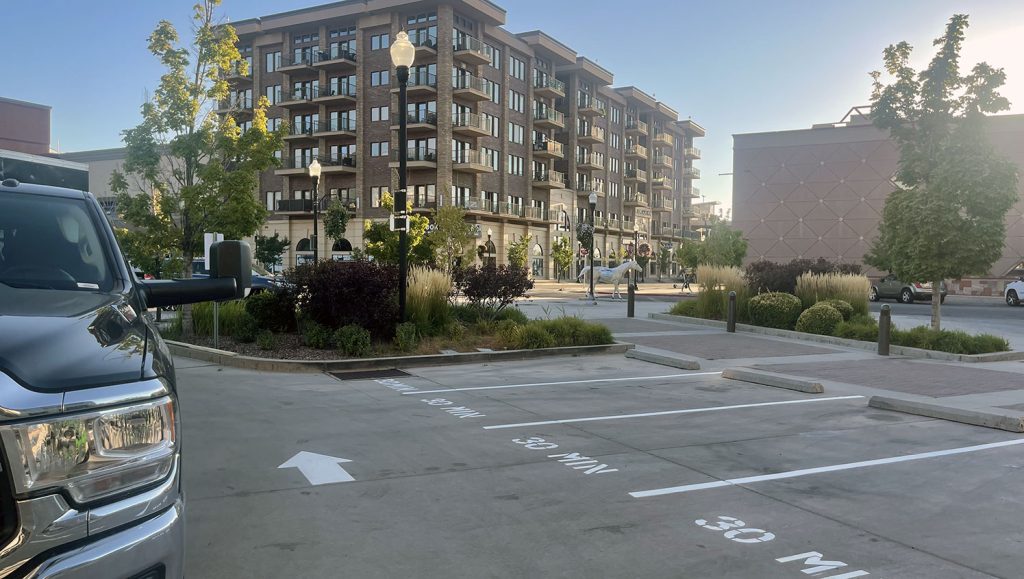 newly marked directional arrows and parking stalls