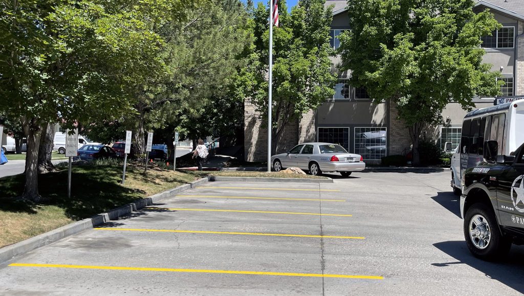 newly striped ADA accessible parking stalls at Pacifica Senior Living Center in Salt Lake City, UT