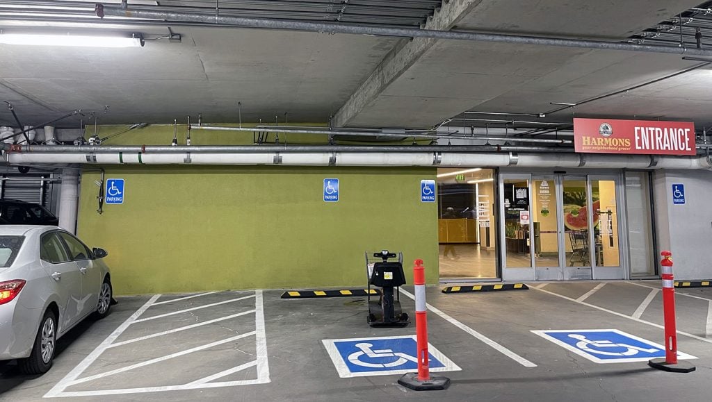 freshly striped electronic vehicle charging station stalls