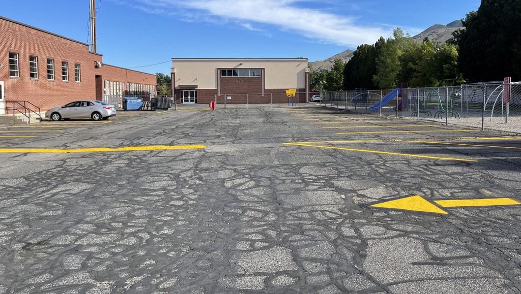 freshly striped parking spaces at reid school